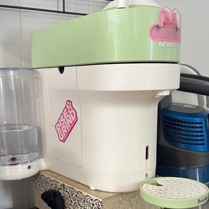 Nespresso Mint Green and White Coffee Maker